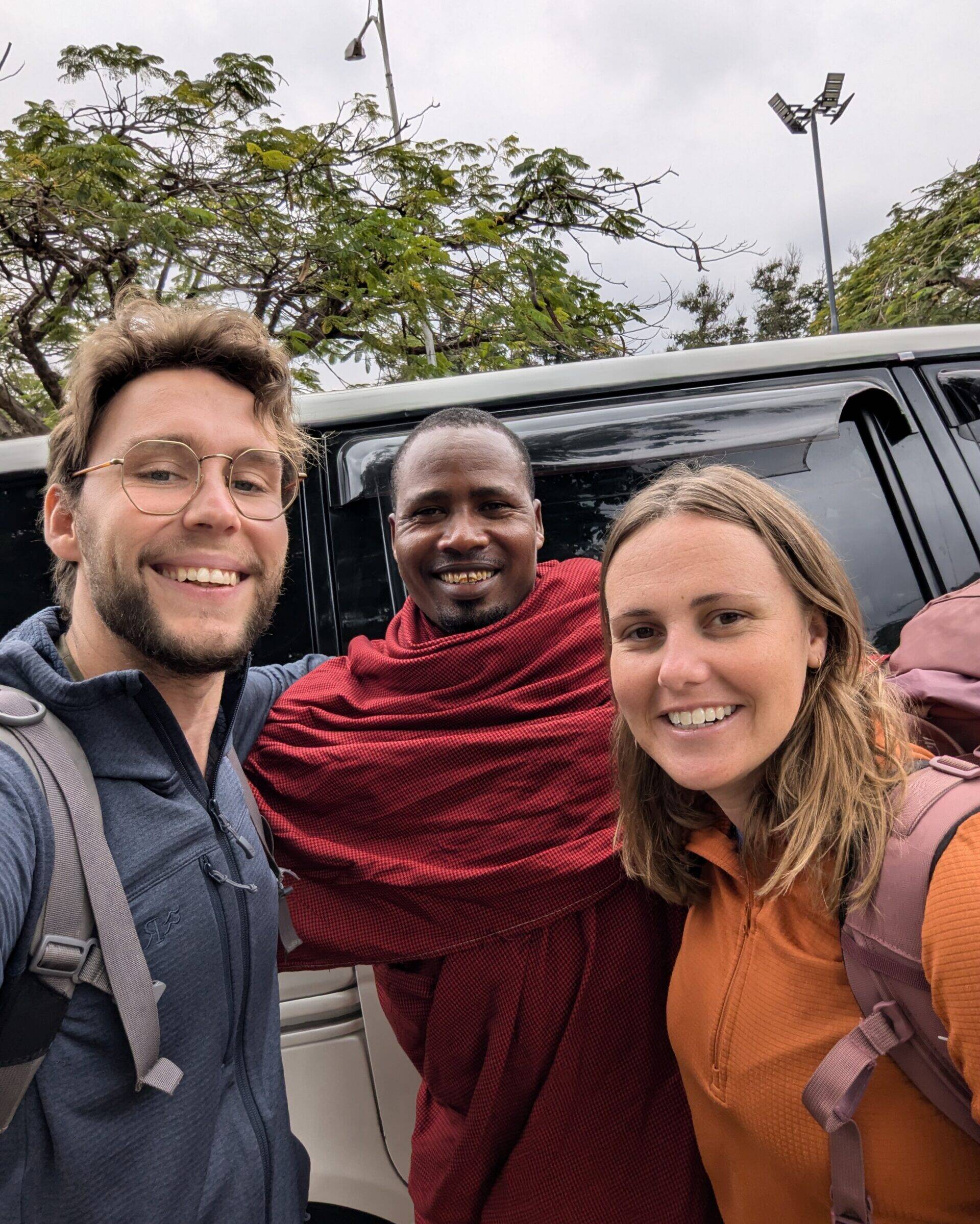 Reuben with volunteers Sarah and Sheldon JRO Airport Tanzania
